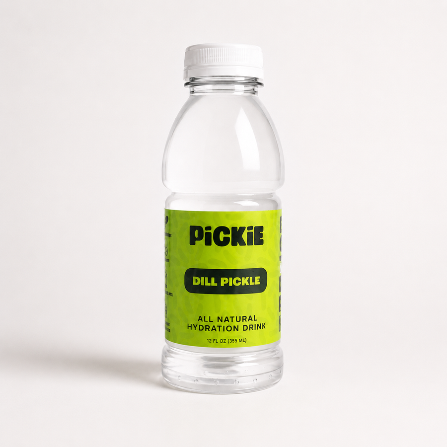 Clear bottle of Pickie Dill Pickle all natural hydration drink on a light gray background