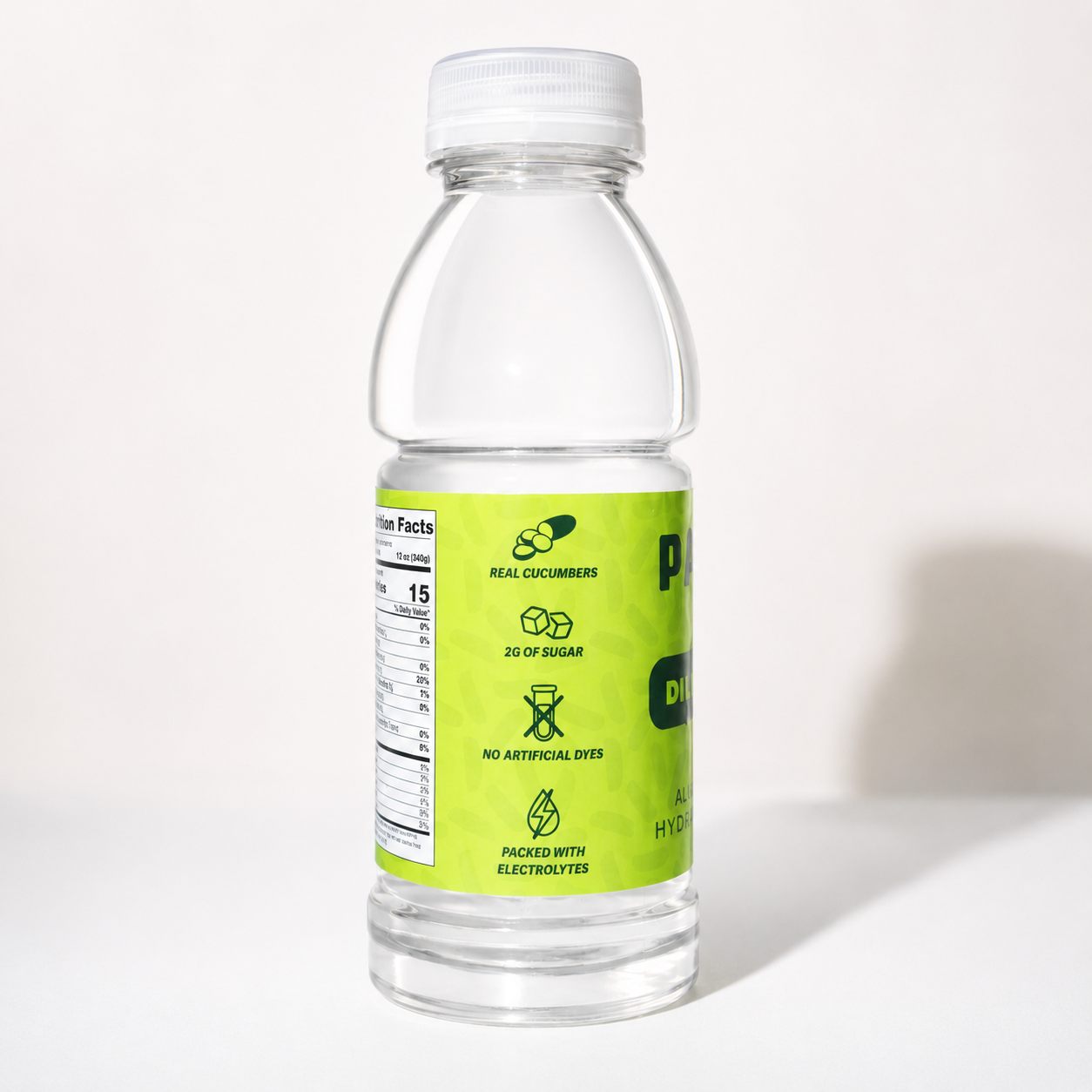 Clear pickle juice bottle with a green label on a white background