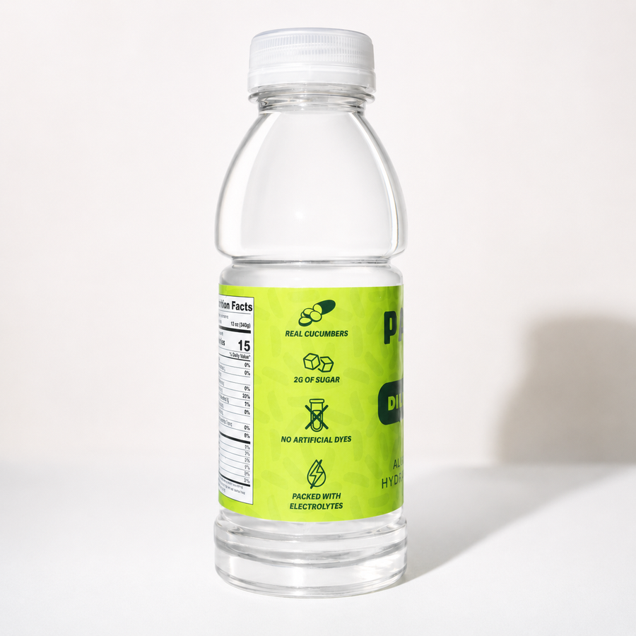 Clear pickle juice bottle with a green label on a white background